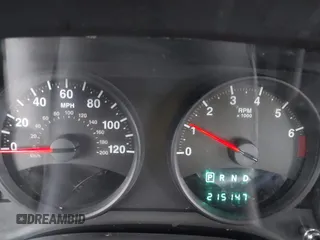 2011 Jeep Patriot Latitude with VIN 1J4NT1GB5BD245263, listed as a IAAI auction lot 41942376 with 215,147 mi miles. Bid and sale history available at carsss.com. Image 7.