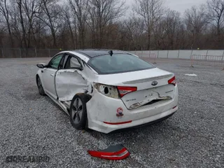 2013 Kia Optima Hybrid EX with VIN KNAGM4AD9D5040367, listed as a IAAI auction lot 41582586 with 152,534 mi miles. Bid and sale history available at carsss.com. Image 6.