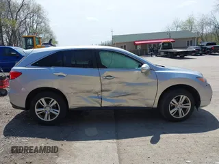 2014 Acura RDX Technology with VIN 5J8TB4H56EL002194, listed as a IAAI auction lot 42096037 with 209,439 mi miles and . Bid and sale history available at DreamBid. Image 13.