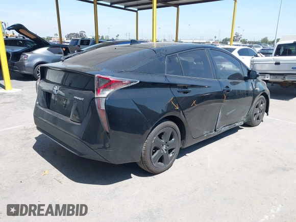 2017 Toyota Prius Two with VIN JTDKBRFU1H3036243, listed as a IAAI auction lot 41991623 with 88,626 mi miles. Bid and sale history available at carsss.com. Image 4.