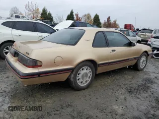 1987 Ford Thunderbird with VIN 1FABP64W7HH137025, listed as a Copart auction lot 80162264 with 137,140 mi miles and Salvage Title. Bid and sale history available at DreamBid. Image 3.