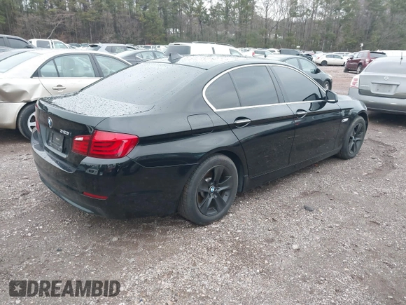 2013 BMW 5 Series 528i with VIN WBAXG5C54DD231297, listed as a IAAI auction lot 41209069 with 79,878 mi miles and . Bid and sale history available at carsss.com. Image 4.