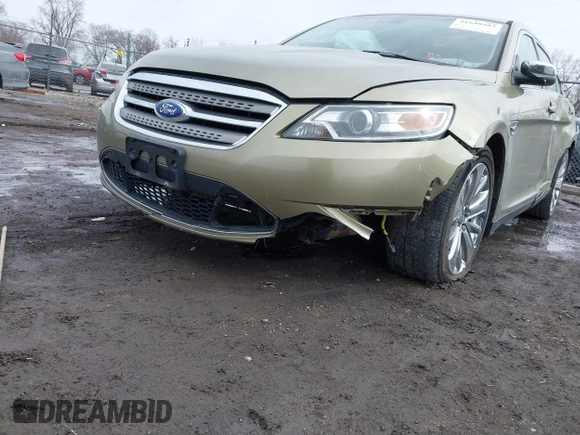 2012 Ford Taurus Limited z VIN 1FAHP2FW7CG128260, wystawiony jako IAAI lot #41640283 z przebiegiem 140 192 mil mil oraz . Historia ofert i sprzedaży dostępna na DreamBid. Obrazek 6.