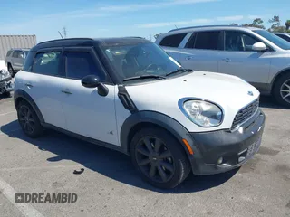 2012 MINI Countryman S z VIN WMWZC5C54CWM11869, wystawiony jako IAAI lot #42265935 z przebiegiem 100 102 mil mil oraz . Historia ofert i sprzedaży dostępna na DreamBid. Obrazek 1.