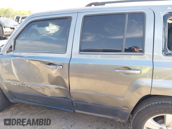 2014 Jeep Patriot Latitude with VIN 1C4NJPFA4ED535148, listed as a IAAI auction lot 42037942 with 192,493 mi miles and . Bid and sale history available at carsss.com. Image 14.