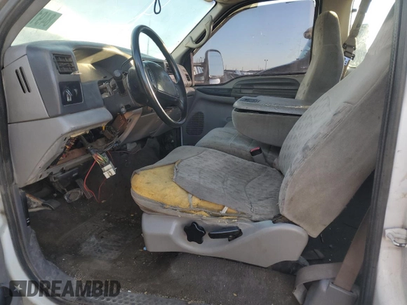 1999 Ford F-250 XL with VIN 1FTNX21S8XEC58955, listed as a Copart auction lot 84917334 with 272,953 mi miles and Salvage title. Bid and sale history available at DreamBid. Image 7.