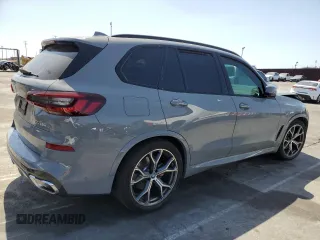 2023 BMW X5 xDrive45e with VIN 5UXTA6C0XP9P49482, listed as a Copart auction lot 56730735 with Not provided miles and Salvage title. Bid and sale history available at DreamBid. Image 3.