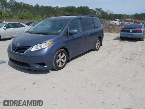 2014 Toyota Sienna LE AAS with VIN 5TDKK3DCXES498110, listed as a IAAI auction lot 41847116 with 242,065 mi miles and . Bid and sale history available at DreamBid. Image 2.