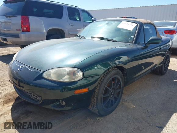 2001 Mazda MX-5 Miata with VIN JM1NB353410202216, listed as a IAAI auction lot 42126191 with Not Provided miles and . Bid and sale history available at DreamBid. Image 2.