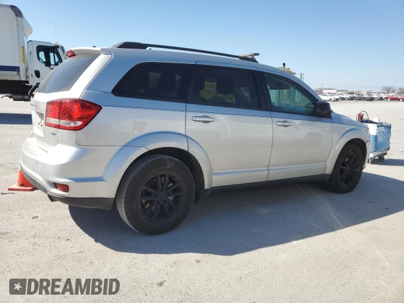 2014 Dodge Journey SXT with VIN 3C4PDCBB4ET124849, listed as a Copart auction lot 48590625 with 196,357 mi miles and Salvage Title. Bid and sale history available at DreamBid. Image 3.