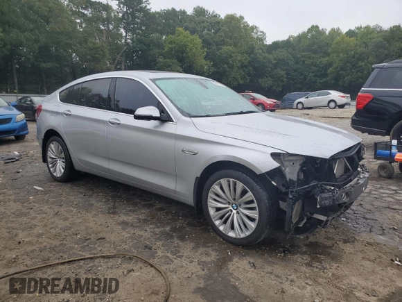 2015 BMW 5 Series 535i Gran Turismo xDrive with VIN WBA5M4C55FD186514, listed as a Copart auction lot 69410704 with 124,398 mi miles and Salvage title. Bid and sale history available at DreamBid. Image 4.
