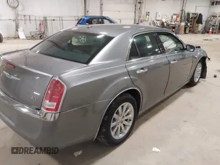 2012 Chrysler 300 Limited with VIN 2C3CCACG3CH173700, listed as a IAAI auction lot 41803306 with 90,924 mi miles. Bid and sale history available at carsss.com. Image 4.