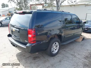 2012 Chevrolet Suburban LT with VIN 1GNSCJE0XCR257186, listed as a IAAI auction lot 41597580 with 174,284 mi miles. Bid and sale history available at carsss.com. Image 4.