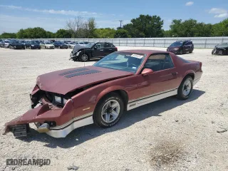 1987 Chevrolet Camaro with VIN 1G1FP21H1HL120950, listed as a Copart auction lot 63494474 with 25,249 mi miles and Salvage Title. Bid and sale history available at carsss.com. Image 1.