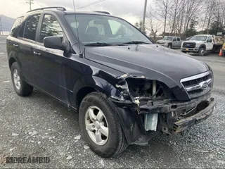 2009 Kia Sorento LX with VIN KNDJD735095890122, listed as a IAAI auction lot 41049479 with 153,333 mi miles. Bid and sale history available at carsss.com. Image 1.