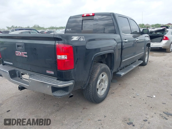 2015 GMC Sierra 1500 SLT with VIN 3GTU2VEC6FG383913, listed as a IAAI auction lot 41888606 with 122,181 mi miles and . Bid and sale history available at DreamBid. Image 4.