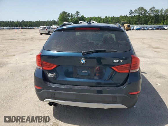 2013 BMW X1 28i z VIN WBAVM1C59DVW41709, wystawiony jako Copart lot #57316485 z przebiegiem 115 563 mil mil oraz Tytuł czysty. Historia ofert i sprzedaży dostępna na DreamBid. Obrazek 6.
