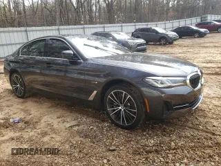 2023 BMW 5 Series 530e with VIN WBA13AG05PCM94563, listed as a Copart auction lot 87515145 with Not provided miles and Salvage title. Bid and sale history available at DreamBid. Image 4.
