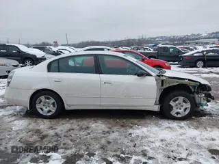 2004 Nissan Altima S with VIN 1N4AL11D64C137926, listed as a IAAI auction lot 41571445 with 124,147 mi miles. Bid and sale history available at carsss.com. Image 14.