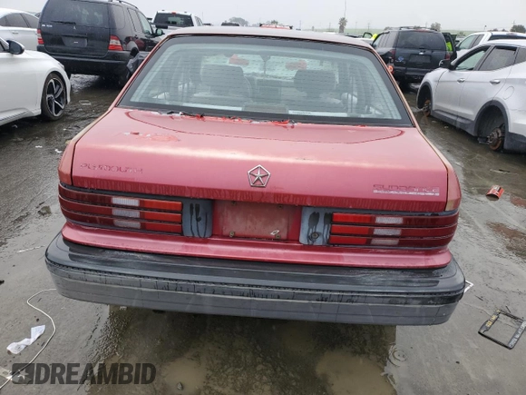 1992 Plymouth Sundance z VIN 1P3XP28D4NN165248, wystawiony jako Copart lot #44205855 z przebiegiem 70 897 mil mil oraz Czysty tytuł • Clean title. Historia ofert i sprzedaży dostępna na DreamBid. Obrazek 7.