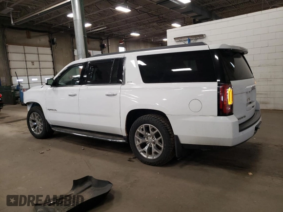 2015 GMC Yukon XL SLT z VIN 1GKS2HKC4FR545409, wystawiony jako Copart lot #55401425 z przebiegiem 214 848 mil mil oraz Czysty tytuł • Clean title. Historia ofert i sprzedaży dostępna na DreamBid. Obrazek 2.