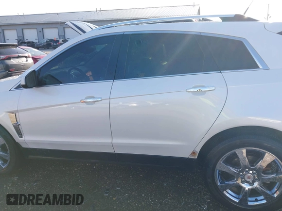 2012 Cadillac SRX Performance Collection with VIN 3GYFNEE35CS561247, listed as a IAAI auction lot 41930292 with 265,599 mi miles and . Bid and sale history available at carsss.com. Image 14.