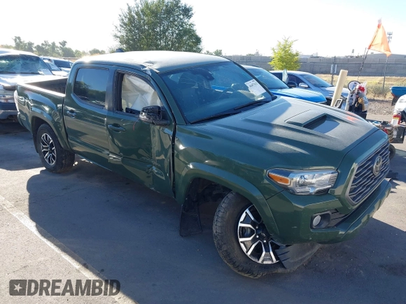 2021 Toyota Tacoma SR with VIN 3TYCZ5AN2MT039450, listed as a IAAI auction lot 40457613 with 54,176 mi miles and . Bid and sale history available at DreamBid. Image 1.