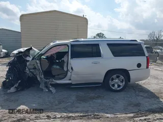 2017 Chevrolet Suburban Premier with VIN 1GNSKJKC0HR288648, listed as a IAAI auction lot 41579677 with Not Provided miles and . Bid and sale history available at DreamBid. Image 13.