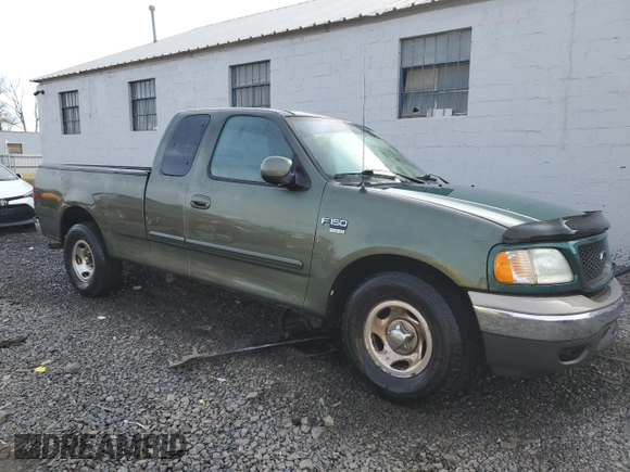 2003 Ford F-150 XL with VIN 1FTRX17W53NA89235, listed as a Copart auction lot 82331144 with 273,766 mi miles and Salvage Title. Bid and sale history available at carsss.com. Image 4.