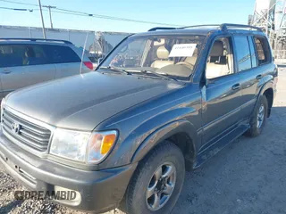 2002 Toyota Land Cruiser with VIN JTEHT05J122022183, listed as a IAAI auction lot 41440395 with 288,686 mi miles. Bid and sale history available at carsss.com. Image 2.