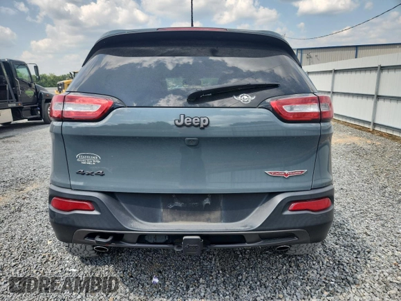 2014 Jeep Cherokee Trailhawk с VIN 1C4PJMBS1EW212024, выставлен на аукционе Copart как лот 58825265 с пробегом 99 087 миль миль и Списание • Salvage title. История ставок и продаж доступна на DreamBid. Изображение 6.