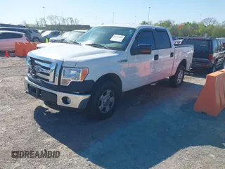 2011 Ford F-150 XL with VIN 1FTFW1EF0BKD23337, listed as a IAAI auction lot 42051889 with 233,747 mi miles. Bid and sale history available at carsss.com. Image 2.