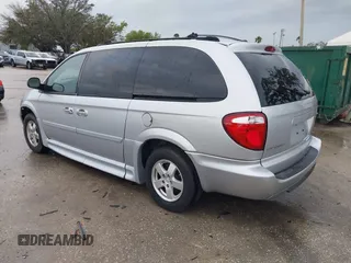 2005 Dodge Caravan SXT with VIN 2D4GP44L85R207743, listed as a IAAI auction lot 41651028 with 56,754 mi miles and . Bid and sale history available at carsss.com. Image 3.