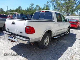 2003 Ford F-150 XLT with VIN 1FTRW07L83KD94698, listed as a IAAI auction lot 41807821 with 177,750 mi miles. Bid and sale history available at carsss.com. Image 4.