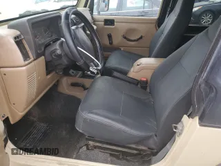 2001 Jeep Wrangler Sport с VIN 1J4FA49S71P312113, выставлен на аукционе Copart как лот 51168125 с пробегом 120 683 миль миль и Списание • Salvage title. История ставок и продаж доступна на DreamBid. Изображение 7.