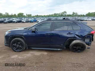 2021 Toyota RAV4 Hybrid XSE with VIN 4T3E6RFV0MU053245, listed as a IAAI auction lot 42426959 with 28,717 mi miles and . Bid and sale history available at DreamBid. Image 14.