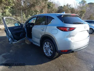 2020 Mazda CX-5 Grand Touring z VIN JM3KFADM0L0738337, wystawiony jako IAAI lot #41485078 z przebiegiem Nie podano mil oraz . Historia ofert i sprzedaży dostępna na DreamBid. Obrazek 3.