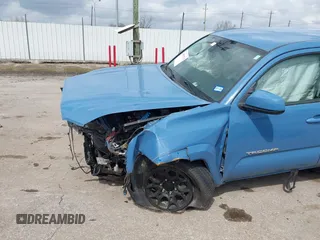 2019 Toyota Tacoma SR z VIN 3TMCZ5AN7KM280607, wystawiony jako IAAI lot #41692718 z przebiegiem 46 084 mil mil oraz . Historia ofert i sprzedaży dostępna na DreamBid. Obrazek 6.