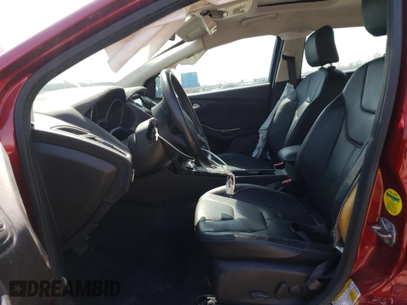 2016 Ford Focus Titanium z VIN 1FADP3J24GL272970, wystawiony jako Copart lot #54539215 z przebiegiem 60 007 mil mil oraz Czysty tytuł • Clean title. Historia ofert i sprzedaży dostępna na DreamBid. Obrazek 7.