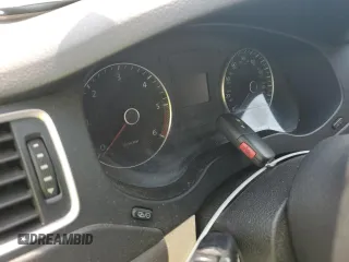 2014 Volkswagen Jetta TDI w/Premium z VIN 3VWLL7AJ6EM421646, wystawiony jako Copart lot #59305895 z przebiegiem Nie podano mil oraz Szkoda całkowita • Salvage title. Historia ofert i sprzedaży dostępna na DreamBid. Obrazek 9.