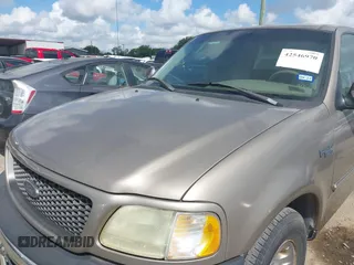 2002 Ford F-150 XL with VIN 1FTRX17222NA12740, listed as a IAAI auction lot 42546970 with 163,344 mi miles and . Bid and sale history available at DreamBid. Image 6.