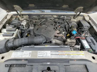 2001 Ford Explorer Sport Trac z VIN 1FMZU77E21UC54692, wystawiony jako Copart lot #57913505 z przebiegiem 204 574 mil mil oraz Czysty tytuł • Clean title. Historia ofert i sprzedaży dostępna na DreamBid. Obrazek 11.