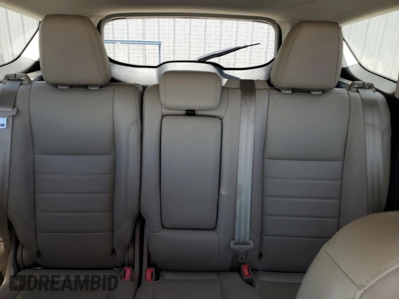 2015 Ford Escape Titanium z VIN 1FMCU0J98FUB06577, wystawiony jako Copart lot #61341175 z przebiegiem 66 206 mil mil oraz Szkoda całkowita • Salvage title. Historia ofert i sprzedaży dostępna na DreamBid. Obrazek 10.