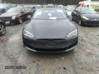 2016 Tesla Model S 70 with VIN 5YJSA1E13GF174542, listed as a IAAI auction lot 41169279 with 72,691 mi miles and . Bid and sale history available at DreamBid. Image 12.