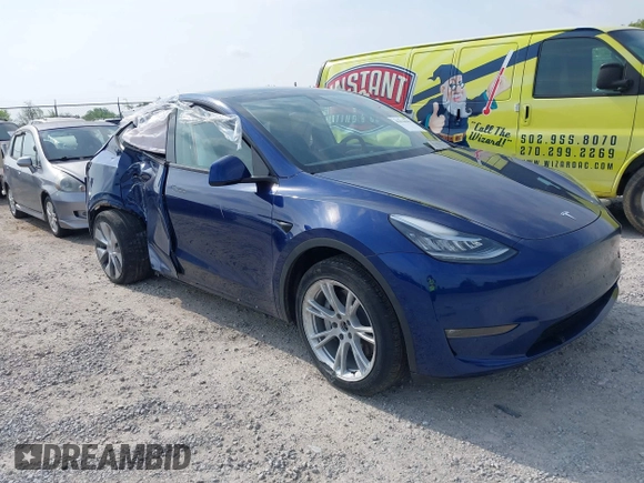 2022 Tesla Model Y Long Range z VIN 7SAYGDEE3NF455544, wystawiony jako IAAI lot #42123963 z przebiegiem 23 882 mil mil oraz . Historia ofert i sprzedaży dostępna na DreamBid. Obrazek 1.