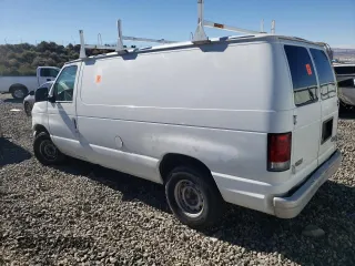 1999 Ford Econoline Cargo with VIN 1FTRE142XXHB29496, listed as a Copart auction lot 64516444 with 206,951 mi miles and Salvage Title. Bid and sale history available at carsss.com. Image 2.