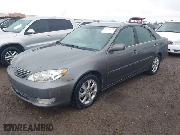 2005 Toyota Camry LE with VIN 4T1BF32K25U595176, listed as a IAAI auction lot 41932171 with 203,956 mi miles and . Bid and sale history available at DreamBid. Image 2.
