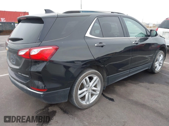 2021 Chevrolet Equinox Premier z VIN 2GNAXXEV4M6118442, wystawiony jako IAAI lot #41392148 z przebiegiem 92 170 mil mil oraz . Historia ofert i sprzedaży dostępna na DreamBid. Obrazek 4.