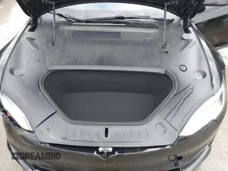 2022 Tesla Model S Plaid with VIN 5YJSA1E60NF460244, listed as a IAAI auction lot 41996403 with Not provided miles and . Bid and sale history available at DreamBid. Image 10.