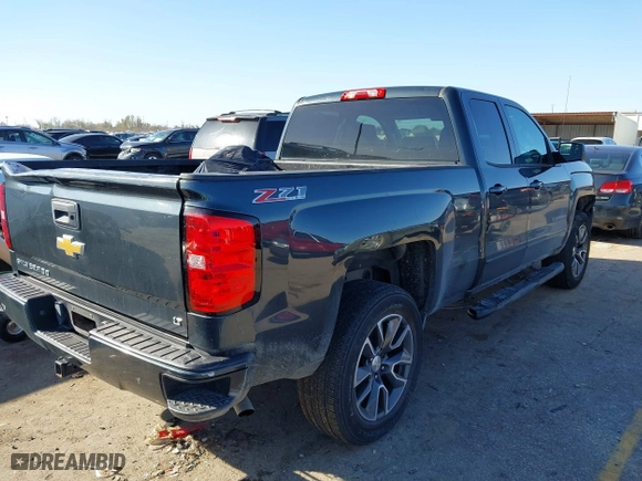2017 Chevrolet Silverado 1500 LT with VIN 1GCVKRECXHZ154083, listed as a IAAI auction lot 41216478 with 153,599 mi miles. Bid and sale history available at carsss.com. Image 4.